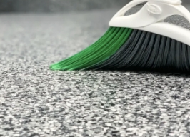 sweeping a polyaspartic floor with a standard house broom