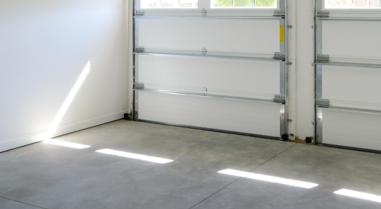 freshly repaired concrete garage floor