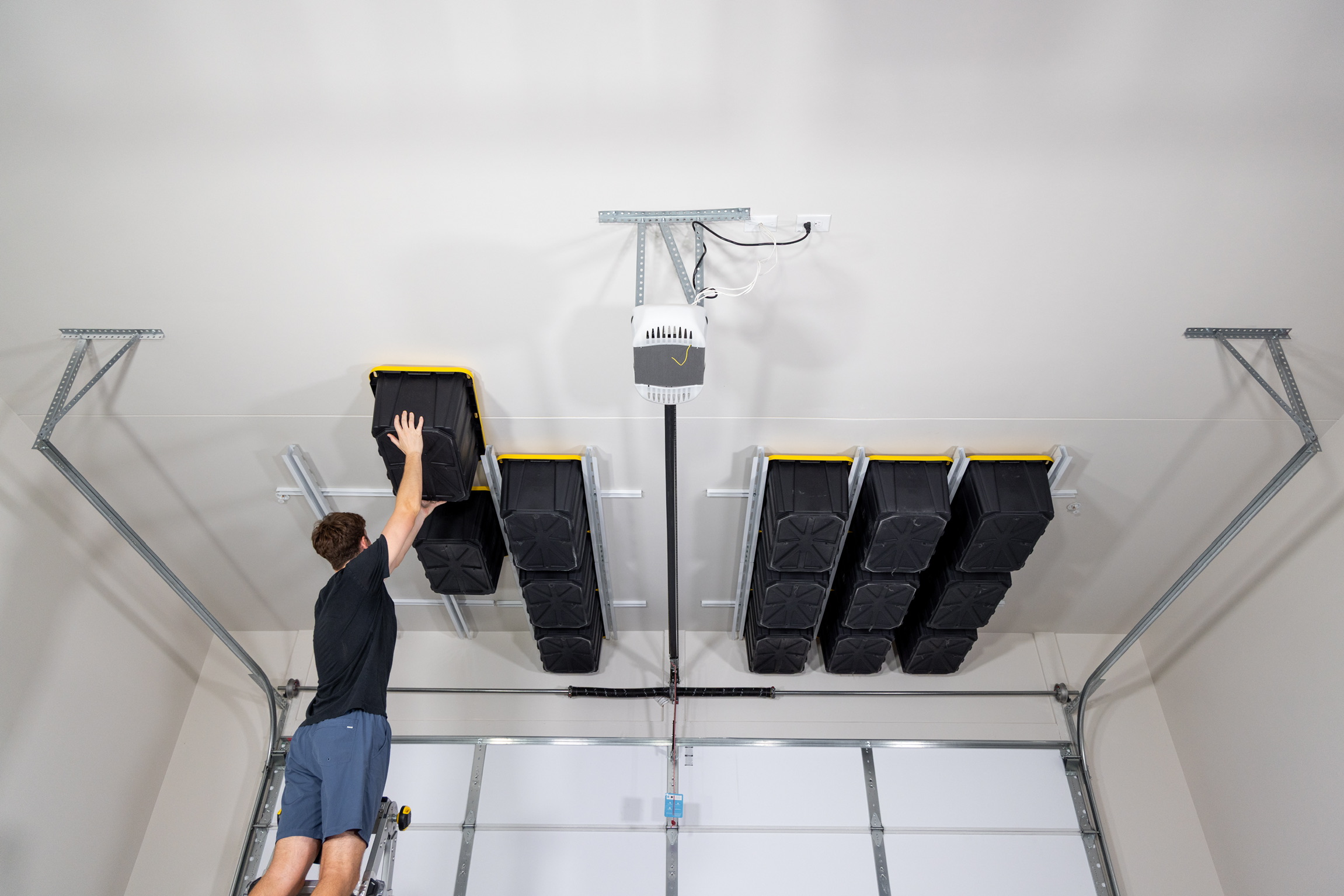 Sliding tote storage installed in a residential garage