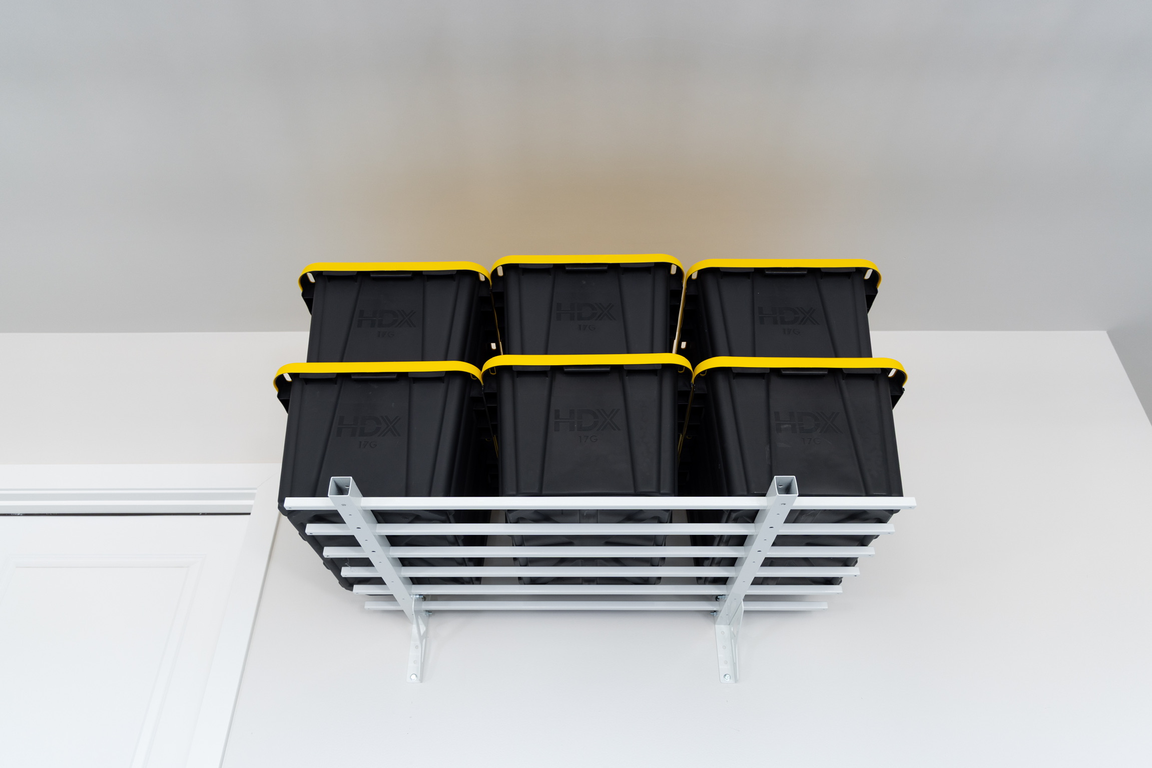 Clear garage floor with wall-mounted storage